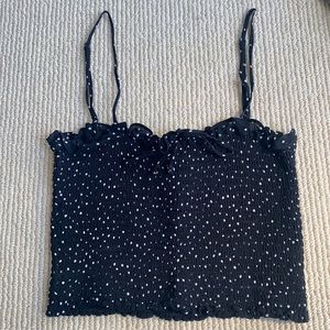 Reformation black polka dot tank top.